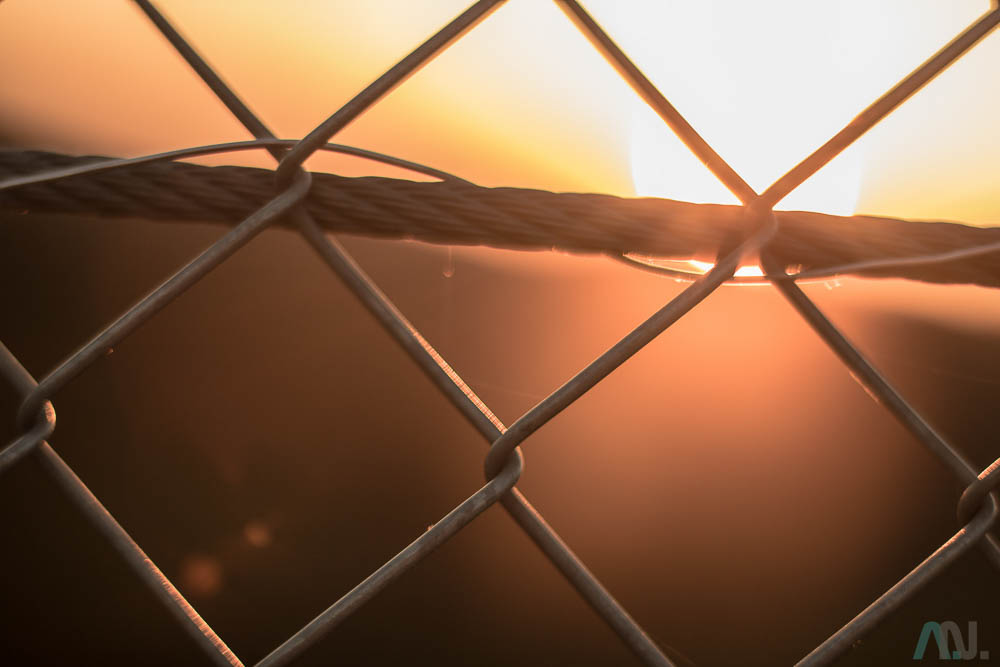 Sonnenuntergang hinter Gitter
